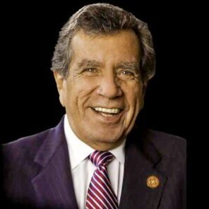 Smiling older man in suit and tie